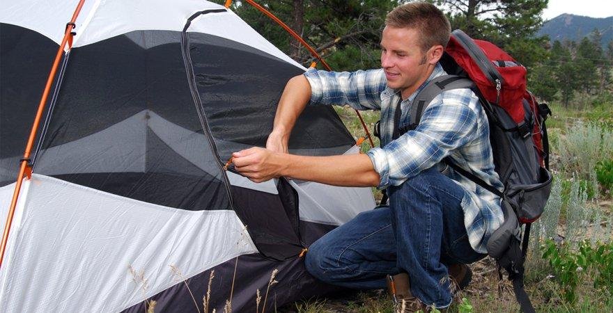 zipping up a tent